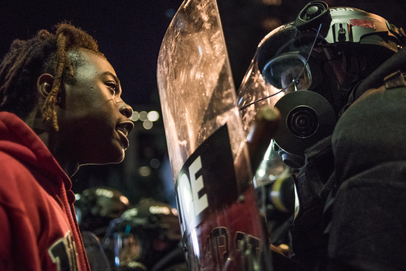 A demonstrator stares down law enforcement during protests Sept. 21, 2016, in Charlotte, N.C.Sean Rayford/Getty Images
